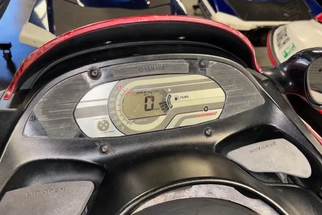 Slide: The Image of 2002 Yamaha WaveRunner FX Cruiser dashboard with digital display and controls. - 11