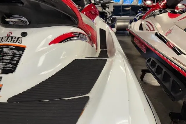 Slide: The Image of 2002 Yamaha WaveRunner FX Cruiser, white and red, close-up view in showroom. - 13