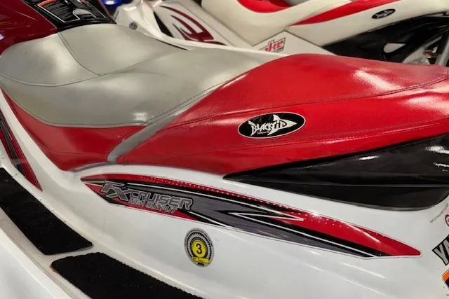 Slide: The Image of 2002 Yamaha WaveRunner FX Cruiser with red and gray seat, close-up view. - 7