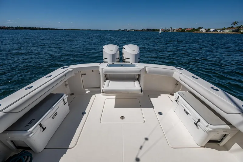 Slide: The Image of 2018 Albemarle 290 Express Fisherman boat deck with seating and ocean view. - 32