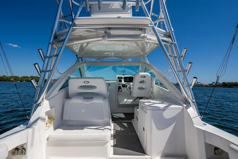 Slide: The Image of 2018 Albemarle 290 Express Fisherman boat interior with seating and control panel. - 37