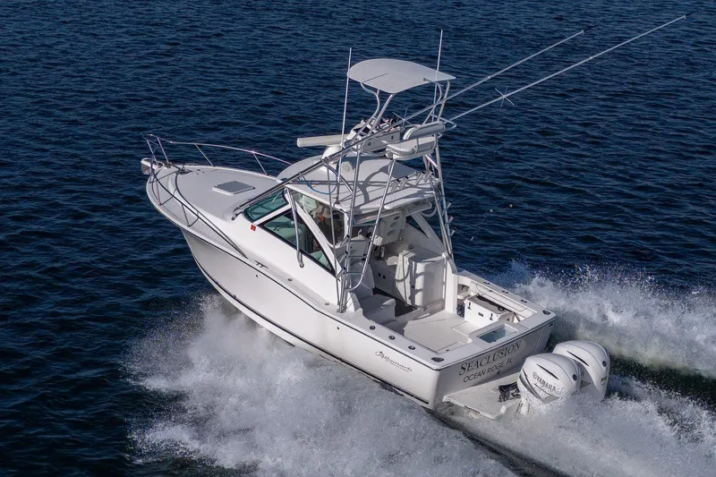 Slide: The Image of 2018 Albemarle 290 Express Fisherman cruising on open water. - 5