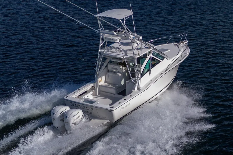 Slide: The Image of 2018 Albemarle 290 Express Fisherman boat cruising on open water. - 7