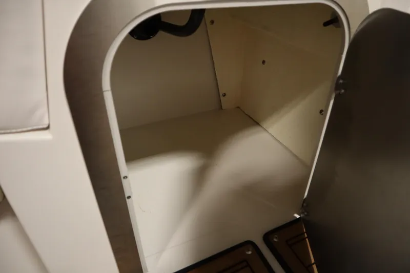 Slide: The Image of Storage compartment inside 2017 Starcraft 221 STARSTEP boat, featuring a clean, spacious interior. - 39