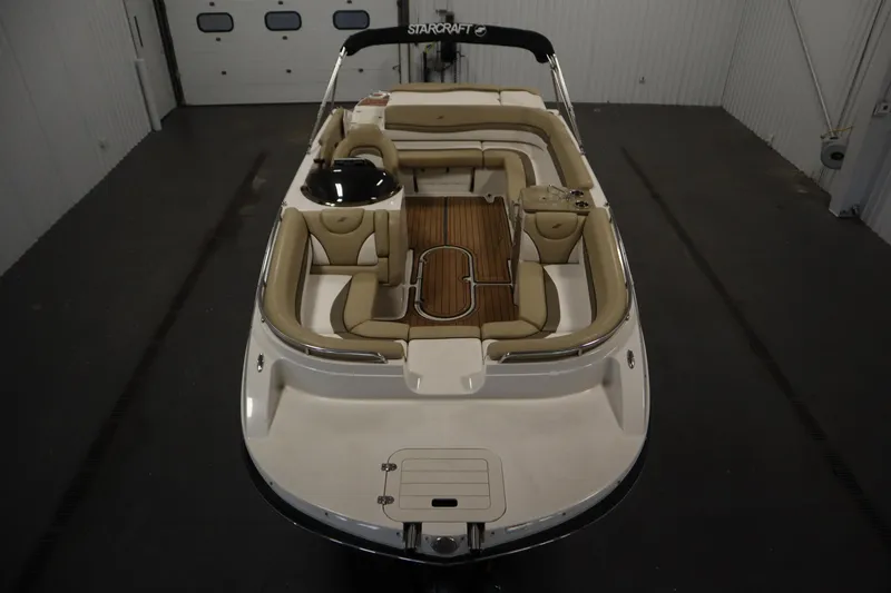 Slide: The Image of 2017 Starcraft 221 STARSTEP boat with spacious seating and elegant interior design. - 9