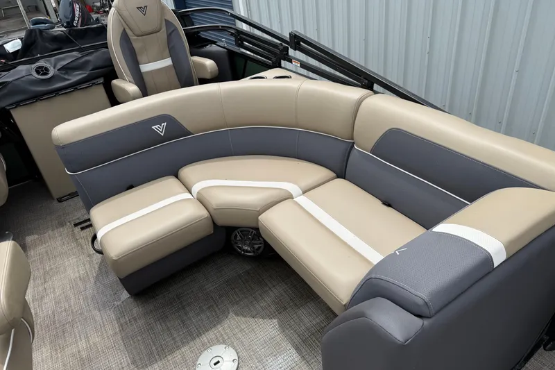 Slide: The Image of 2024 Viaggio 18 FISH boat interior with beige and gray seating. - 7