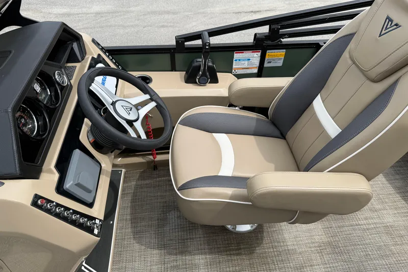 Slide: The Image of 2024 Viaggio 18 FISH boat interior with steering wheel and captain's chair. - 9