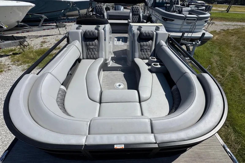 Slide: The Image of 2021 Bennington 25 RTSB pontoon boat with luxurious seating and modern design. - 17