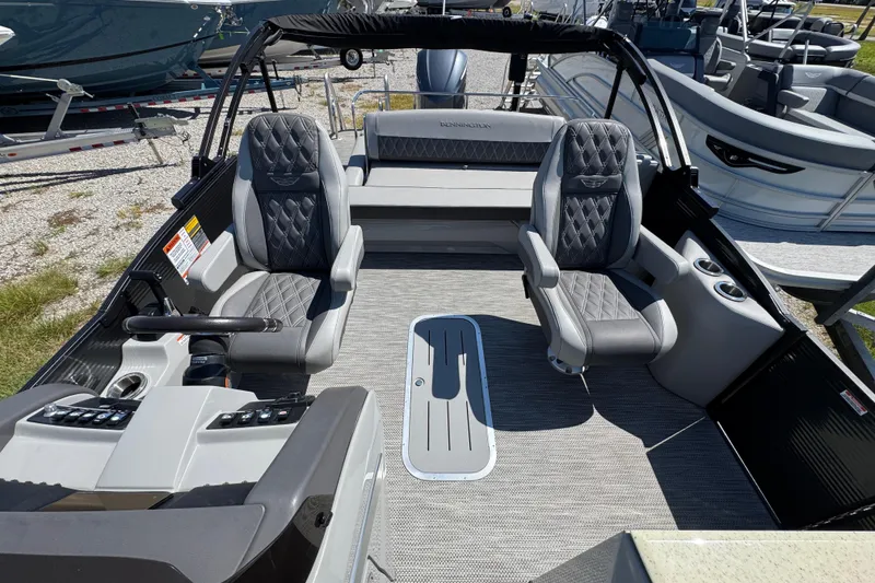 Slide: The Image of 2021 Bennington 25 RTSB boat interior with luxurious seating and modern design. - 27