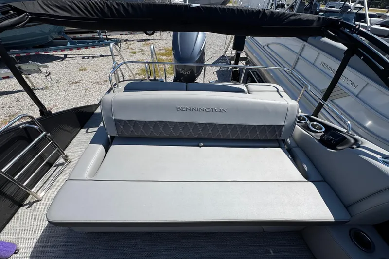 Slide: The Image of 2021 Bennington 25 RTSB boat with luxurious seating and sleek design. - 28