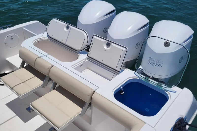 Slide: The Image of 2018 Everglades 355 Center Console boat with Yamaha 300 engines and seating. - 12