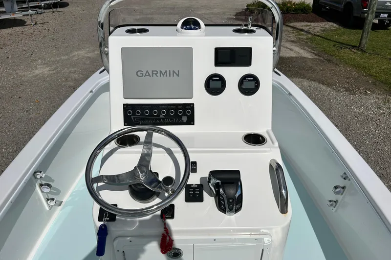 Slide: The Image of 2025 Dragonfly Boatworks Spanish Wells 21 console with Garmin navigation system. - 16