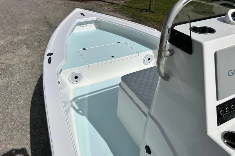 Slide: The Image of 2025 Dragonfly Boatworks Spanish Wells 21, sleek white interior, modern design. - 18