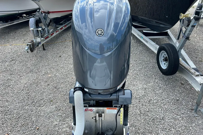 Slide: The Image of 2025 Dragonfly Boatworks Spanish Wells 21 with Yamaha outboard motor on trailer. - 28