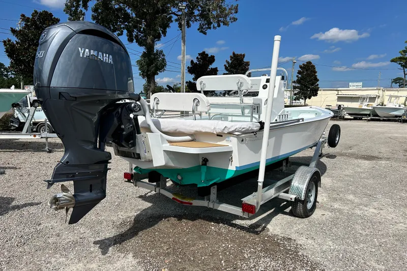 Slide: The Image of 2025 Dragonfly Boatworks Spanish Wells 21 on trailer with Yamaha outboard motor. - 5