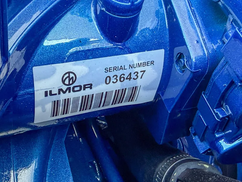 Slide: The Image of Ilmor serial number on blue MasterCraft XT25 2024 engine. - 23