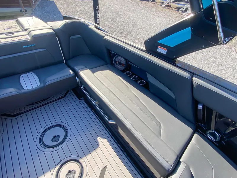 Slide: The Image of 2024 MasterCraft XStarS interior with gray seating. - 19