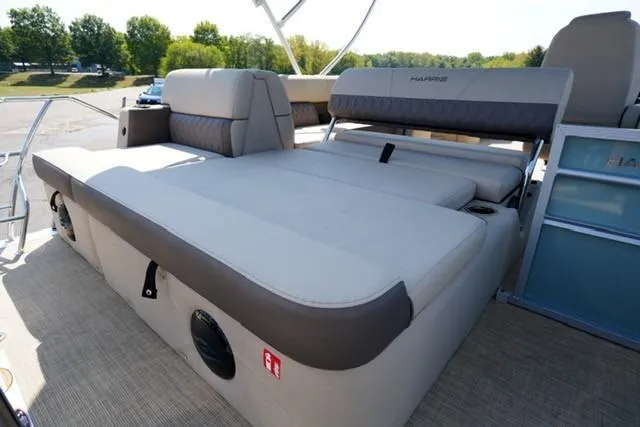 Slide: The Image of 2026 Harris Cruiser 210 boat interior with spacious seating and sun deck. - 15