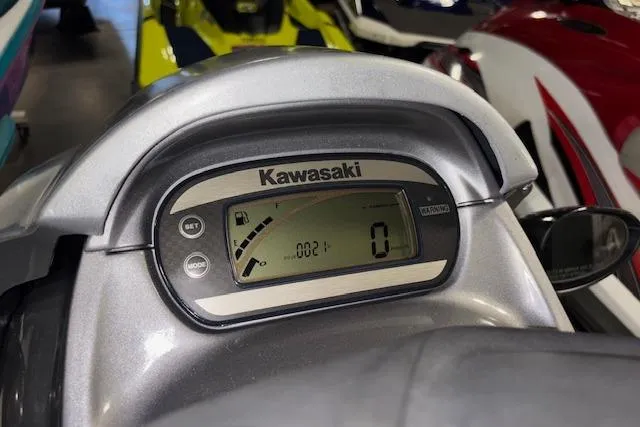 Slide: The Image of 2008 Kawasaki Jet Ski STX-15F dashboard with digital display and controls. - 11