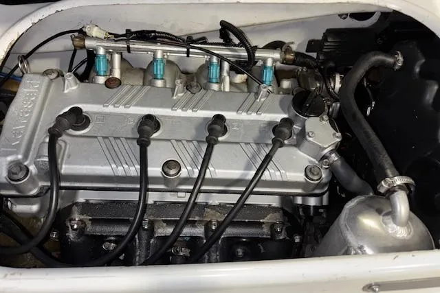 Slide: The Image of 2008 Kawasaki Jet Ski STX-15F engine compartment, showcasing internal components and wiring. - 9