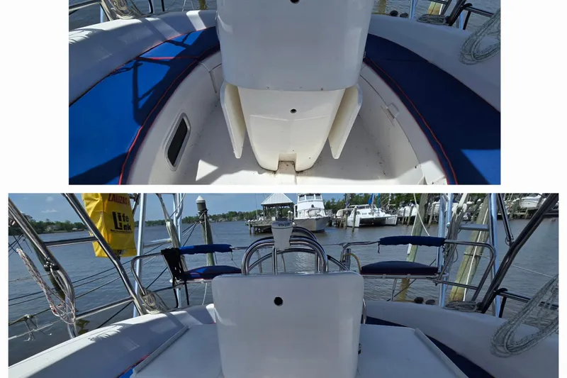 Slide: The Image of 2003 Hunter 386 sailboat cockpit with blue seating and marina view. - 4