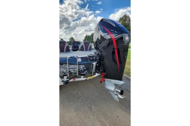 Slide: The Image of 2025 Ranger ALPHA 208 boat with powerful outboard motor on a sunny day. - 4