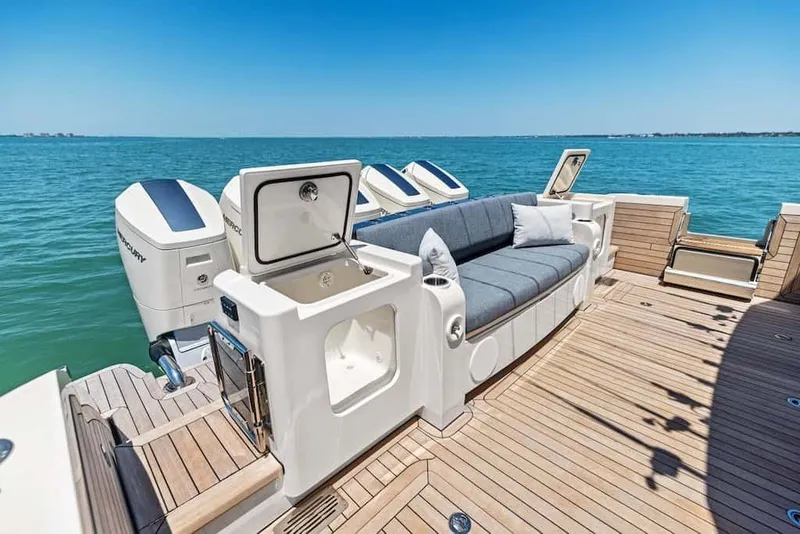 Slide: The Image of Luxurious 2026 Scout 670 LX boat with spacious deck and comfortable seating. - 11