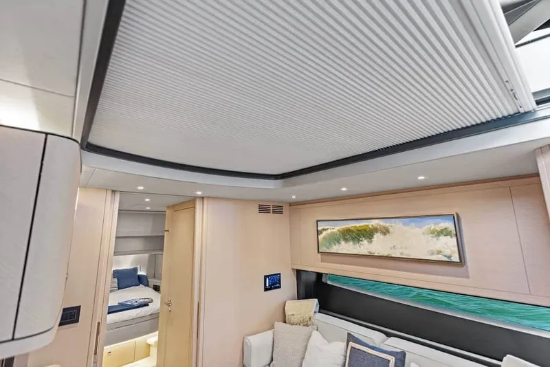 Slide: The Image of Luxurious interior of 2026 Scout 670 LX yacht with modern decor and comfortable seating. - 31