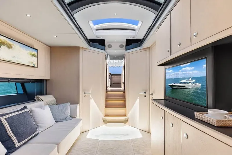 Slide: The Image of Luxurious interior of 2026 Scout 670 LX yacht with modern design and comfortable seating. - 34