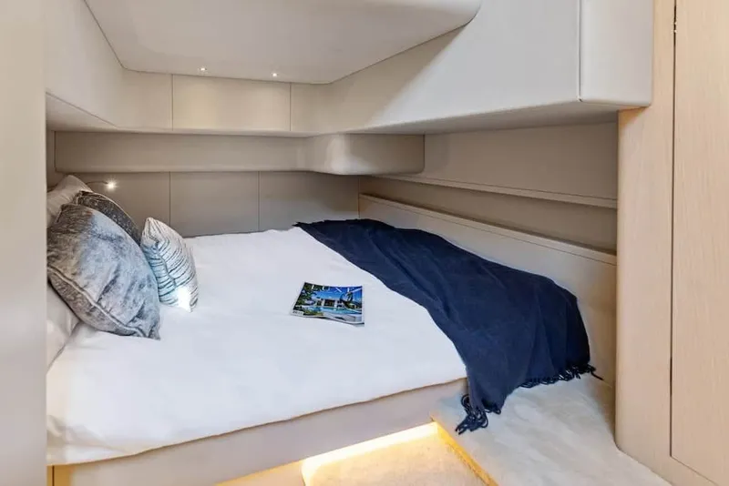 Slide: The Image of Luxurious cabin interior of 2026 Scout 670 LX yacht with cozy bedding. - 35