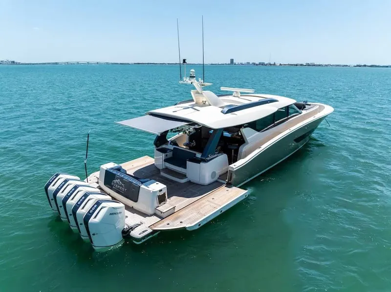 Slide: The Image of 2026 Scout 670 LX luxury yacht on open water, featuring multiple outboard engines. - 41