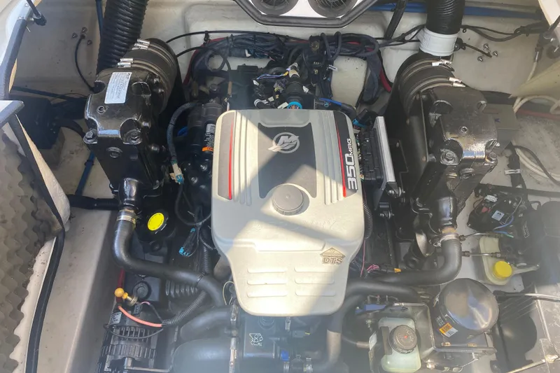 Slide: The Image of Engine compartment of a 2008 Sea Ray 260 Sundeck boat, featuring a 350 MAG engine. - 12