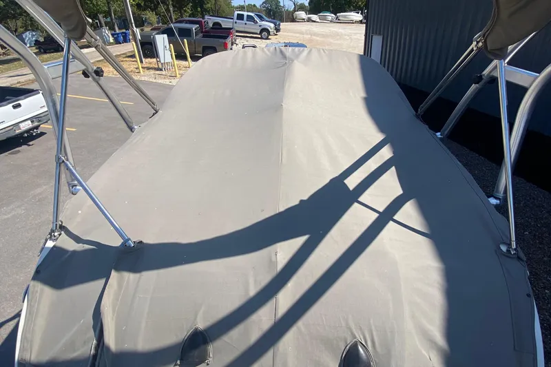 Slide: The Image of Covered 2008 Sea Ray 260 Sundeck boat in parking lot, viewed from above. - 13