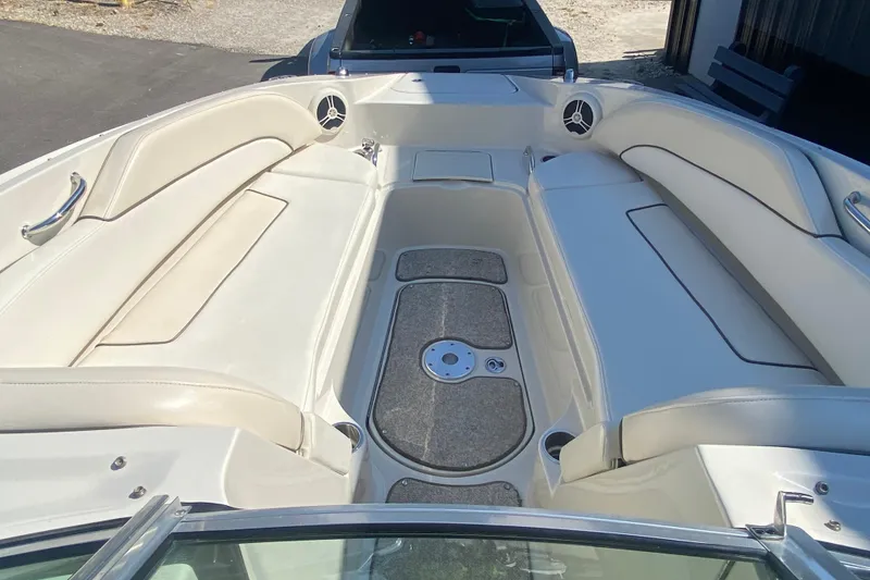 Slide: The Image of 2008 Sea Ray 260 Sundeck interior with spacious seating and sleek design. - 8
