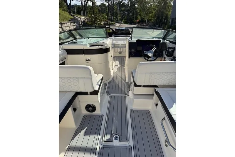 Slide: The Image of 2019 Sea Ray SDX 290 Outboard interior with sleek seating and modern dashboard. - 30