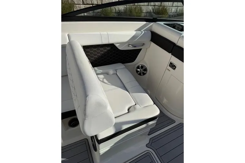 Slide: The Image of 2019 Sea Ray SDX 290 Outboard interior with white seating and modern design. - 31