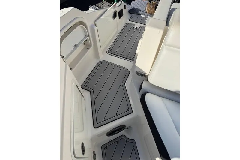 Slide: The Image of 2019 Sea Ray SDX 290 Outboard interior with sleek seating and non-slip flooring. - 34