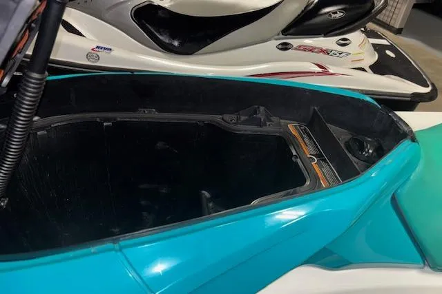 Slide: The Image of 2021 Sea-Doo GTX storage compartment, open view, showcasing interior space and design. - 13