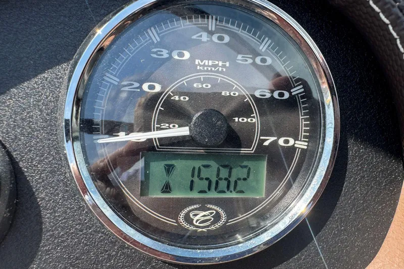 Slide: The Image of Speedometer of a 2013 Cobalt 220 showing 158.2 miles. - 38