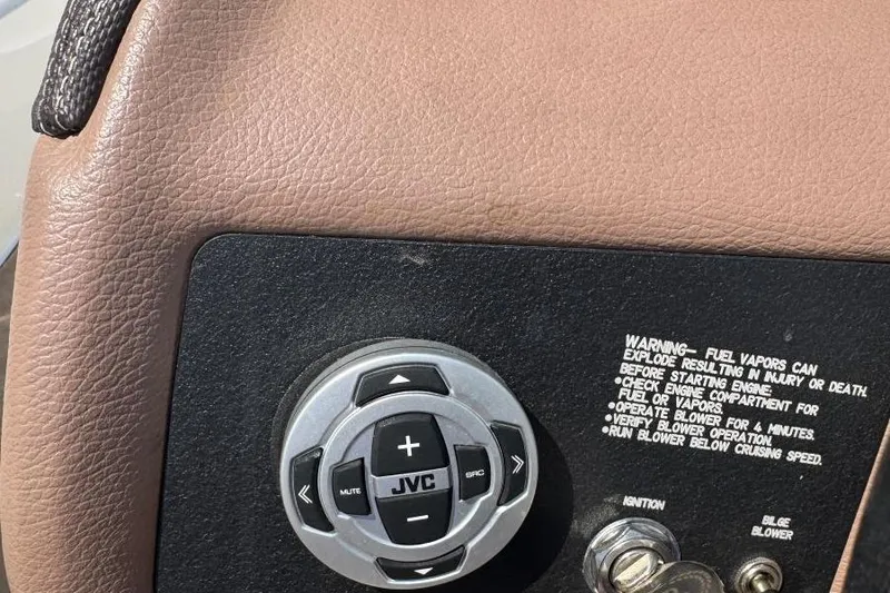 Slide: The Image of Control panel of a 2013 Cobalt 220 boat with JVC audio system. - 39