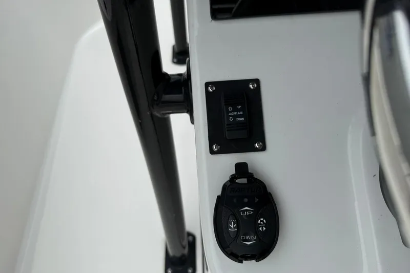 Slide: The Image of 2023 Sea Pro 248 Bay boat control panel with jackplate switch and Raptor control. - 16
