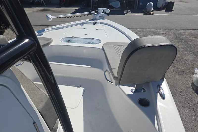 Slide: The Image of 2023 Sea Pro 248 Bay boat interior with seating and trolling motor. - 30