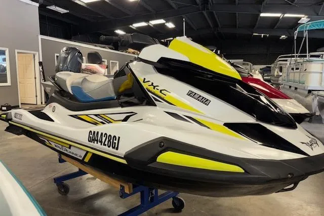 The Image of 2021 Yamaha WaveRunner VX-C Jetski in showroom, featuring sleek design and vibrant yellow accents. - 1