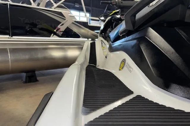 Slide: The Image of 2021 Yamaha WaveRunner VX-C Jetski in showroom, close-up view of side and handlebars. - 10