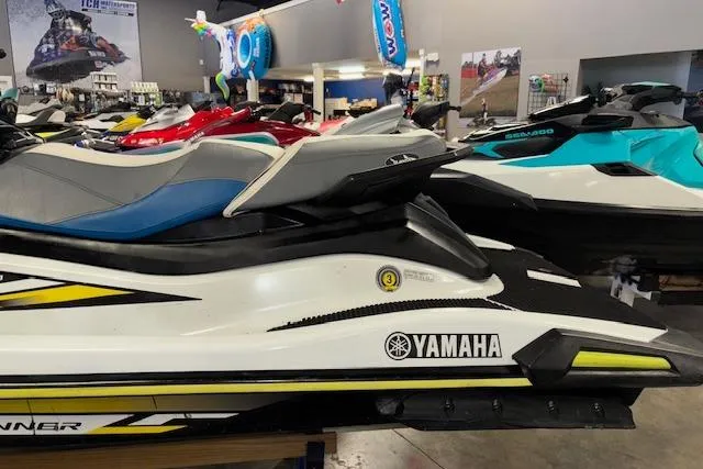 Slide: The Image of 2021 Yamaha WaveRunner VX-C Jetski displayed in a showroom with other models. - 5