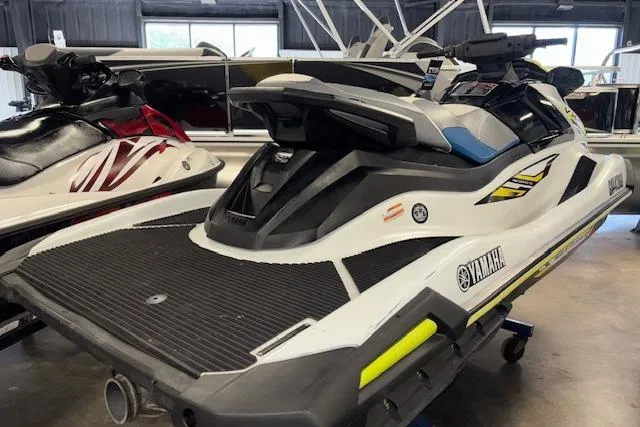 Slide: The Image of 2021 Yamaha WaveRunner VX-C Jetski in showroom, rear view, white and black design. - 9