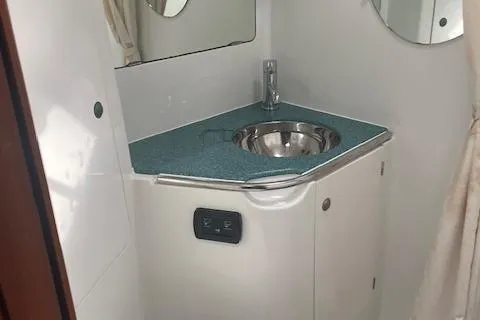 Slide: The Image of Bathroom sink area on a 2002 Jeanneau Sun Odyssey 45.2 yacht. - 17