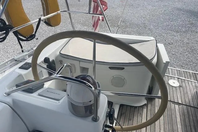 Slide: The Image of Steering wheel of 2002 Jeanneau Sun Odyssey 45.2 sailboat, featuring cockpit and deck details. - 5
