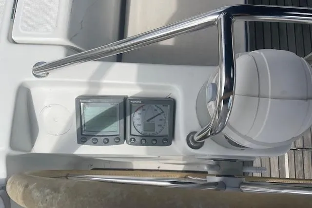 Slide: The Image of Cockpit of 2002 Jeanneau Sun Odyssey 45.2 sailboat with navigation instruments. - 8