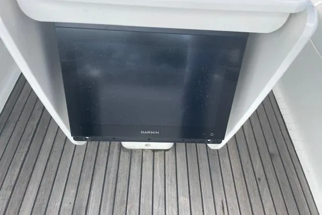 Slide: The Image of Garmin navigation screen on Jeanneau Sun Odyssey 45.2 yacht, 2002 model, with wooden deck. - 9